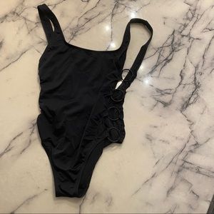 Solid and striped one piece with rings on the side